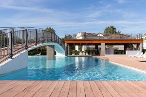 Pool-view flat with fenced garden