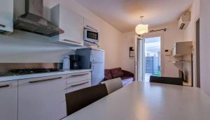 Pool-front apartment with fenced garden and bbq