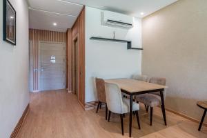 Magnifique appartement rez-de-jardin face piscine