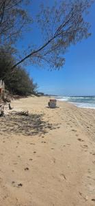 cobertura pé na areia com banheira vista mar