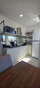 cobertura pé na areia com banheira vista mar