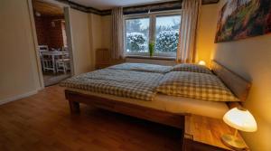 Winterruhe am See, mit gemütlichem Abendfeuer, purer Natur & einem warmen Kachelofen in Omas lütter Obstbutze