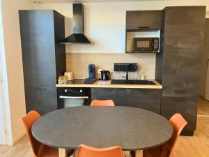 T2 moderne et calme - face gare & proche centre