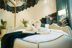 Binghatti Aurora, JVC Dubai - Unique Round Bed Experience with pool view