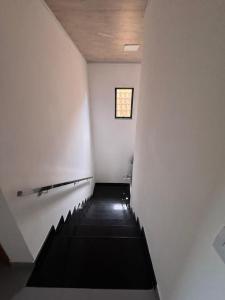 SlimHaus pé na AREIA