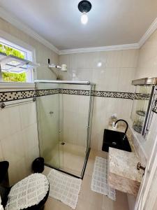 Casa Sol do Village, na praia de Taperapuã