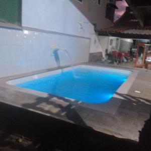 Casa com 5 quartos, hidromassagem e piscina