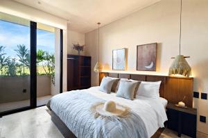 Beachfront 2BR Condo in Bahía Tankah, Tulum