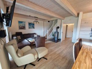 Halligwelt 18 - Ferienhaus mit Kamin, Sauna und Garten