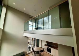 Unique mezzanine style one bedroom penthouse