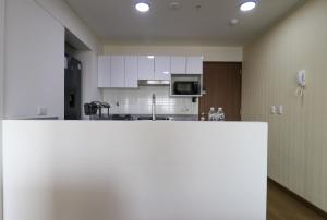 Stunning 2BR with Balcony & City Views