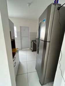 Casa nova em condomínio em Parnaíba pertinho da praia