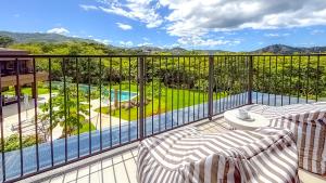 Condo Pool View + Beach Clulb in Playas del Coco | Naumi N531