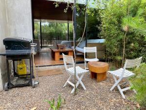 Refugio en el bosque con vista a la bahía
