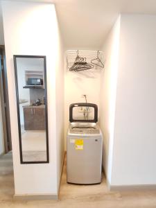 Apartamento moderno frente a la Universidad Santo Tomás WiFi y parqueadero