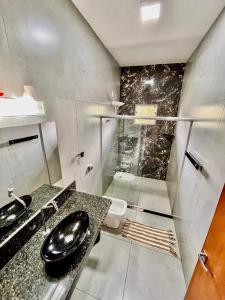 Casa com piscina e cascata e spa fogão a lenha