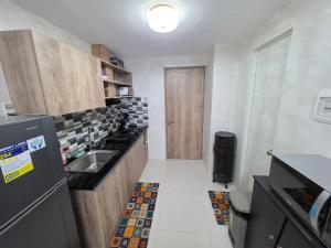 Jearl Cozy and Homey Penthouse with balcony at Primeworld District Mactan Tower P