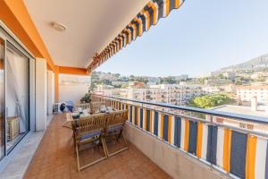 Bright Sea-View 1-Bedroom Apartment with Terrace & Private Garage 2 min Walk to Beach