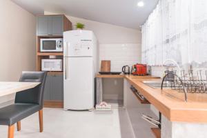 Flat Flores de Bombinhas Oficial