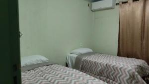 Casa Amarela Superhost 3 quartos 2Wc 1Suite piscina a 20min das Cataratas ar split e piscina 9 pax