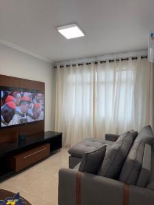 Ap Aconchegante, prédio frente mar