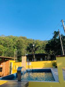 Casa em Ubatuba com piscina há 15 minutos das praias