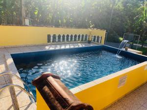 Casa em Ubatuba com piscina há 15 minutos das praias