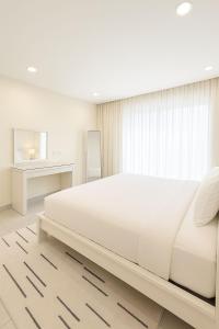 1BHK top-floor with city view at Ghubra Beach