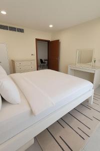 1BHK top-floor with city view at Ghubra Beach