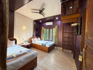 Chitwan Forest Resort with swimming pool , Chitwan National Park