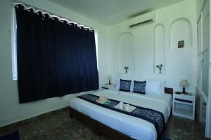 Beachouse Beachfront Cottages And Suites