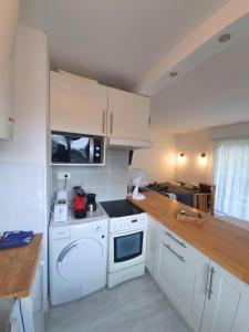 Appartement T2 4p idéalement placé Port, 150m plage du Nau, commerces