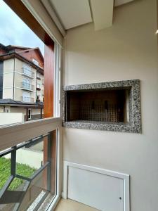 Apê com Lareira a 260m da Catedral de Pedra