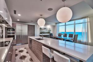 2-Story Penthouse Condo with Beachfront Views