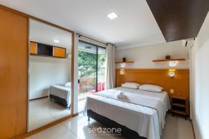 Apto c varanda a passos do mar em Ilheus ERW0301