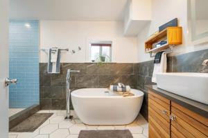 Charming City Home with Patio Fire Pit & Record Player-Family Friendly