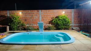 Casa com piscina 270m da praia