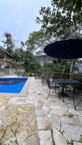 Ubatuba coast house with ocean view and sea access