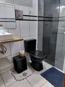 Casa aconchegante térrea à 3min de carro do centro e praia central