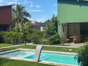 Casas aconchegantes com piscina na encantadora Praia das Cigarras