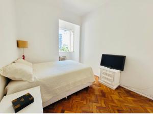 Quarto em apartamento aconchegante no carnaval