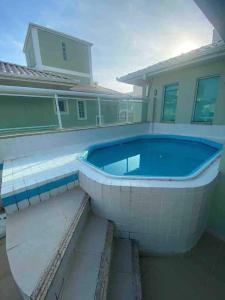 Casa com piscina a 400m da praia de Palmas