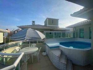 Casa com piscina a 400m da praia de Palmas