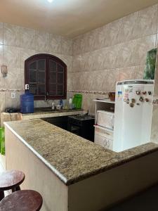 Conforto e simplicidade! Casa top com garagem, cozinha, banheiro e quarto