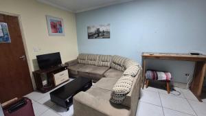 Apto na Tupi a poucos passos da praia