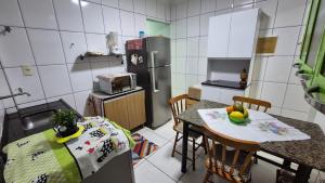 Apto na Tupi a poucos passos da praia