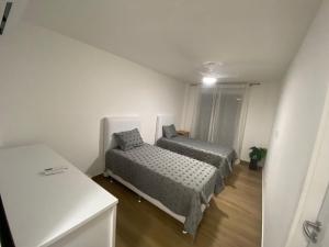 Surf Paradise Pé na Areia