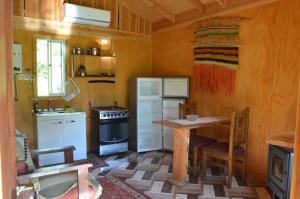 Cabañas y tinajas Rukaleufu