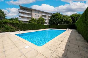 LÉcrin Toulousain - Piscine partagée et parking