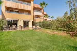 Sunny Getaway with Pool Access & Private Yard